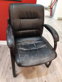 Worn down leather chair