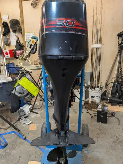 97 mercury 50hp 4 stroke tiller model with power tilt ,One owner, this motor runs good, water pump A...