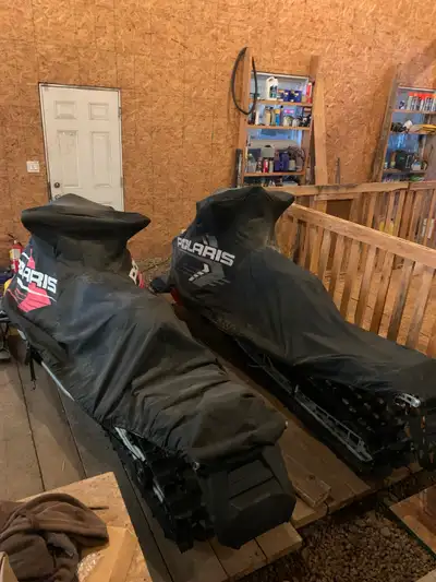 Two Polaris snowmobiles for sale as a pair. 1-2014 RMK 800 155” has Aprox 2500 KM +/- Has had new to...