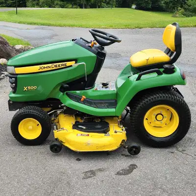 2013 John Deere X500 with bagger, snow blower and mulch sys.