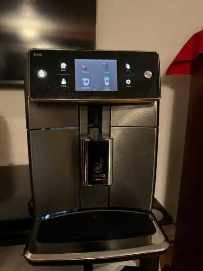 Saeco Xelsis Super-Automatic Espresso Machine Turn your kitchen into your own personal coffee house...