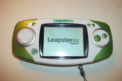 Has built in camera and video recorder and microphone and stylus. Includes 4 AA rechareable batterie...
