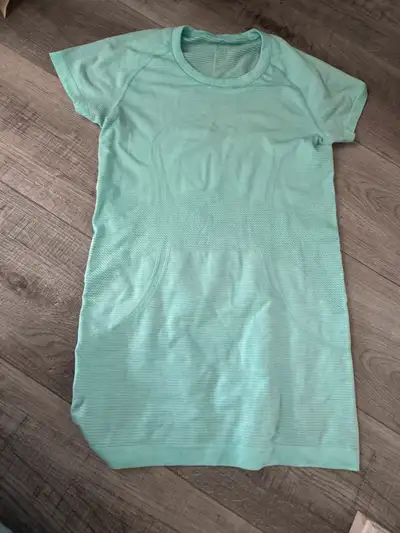 Lululemon turquoise shirt (size 8). Used once., View more