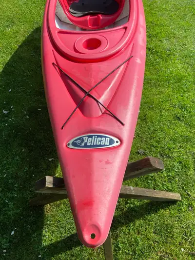 10’ Sit in kayak , made by Pelican. With two storage areas and cup holder, and adjustable foot rests...