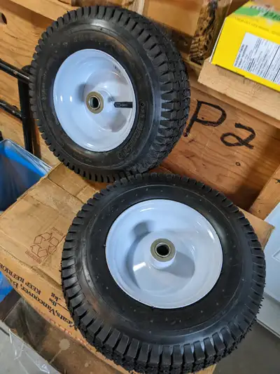 NEW ; 2 - 13 x 5 x 6in turf traction wheels & tires . Actual tire size 12in x 4in w. 3/4in bearing h...
