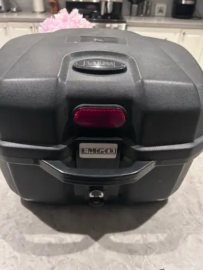 EMGO travel top case which includes case, mounting plate, hardware and a key. Not sure of the exact...
