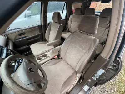 I'm selling a Honda CR-V, a compact SUV known for its reliability and practicality, featuring spacio...