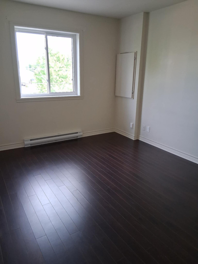 4 1/2 au niveau 2 d'un triplex Les Coteaux dans Locations longue durée  à Ouest de l’Île - Image 3