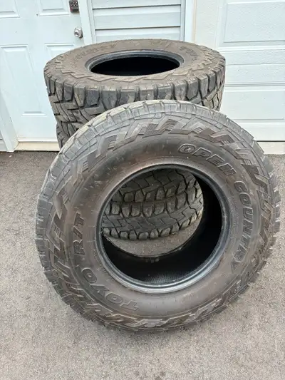 Toyo Open Country R/T tires (set of 4). At least 50 percent tread left. 37” x 12.5 wide x 18” rim. $...