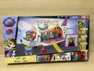 Hard to find retired LPS jet with pets. Box has some shelf wear and seals popped but everything is s...