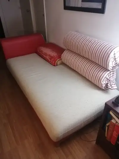Couch with two pillows, View more
