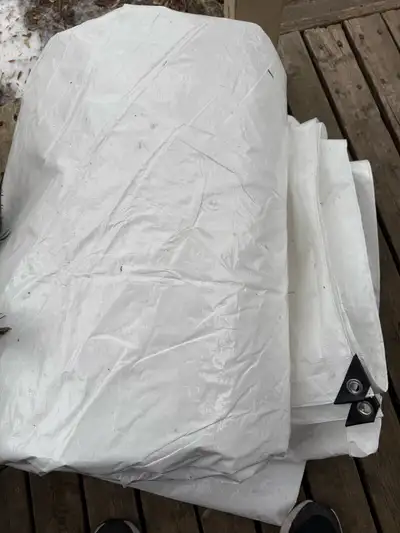 This is a new been got from large piece 17-1/2 x 48 white tarp, perfect for creating an ice rink or...