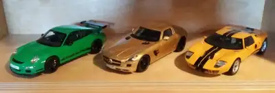 Selling several 1:18 diecast models. All models are in mint condition and 100% complete with their o...