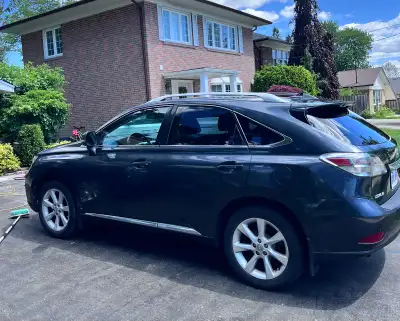I'm selling my Lexus RX350 Premium Package 2 in Smoky Granite Mica with Black Leather and Brown Waln...