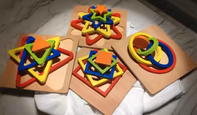 Colourful, wooden, shapes for toddlers.