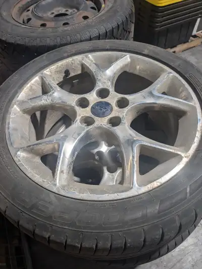 215/50/17 with some life left, off a ford focus