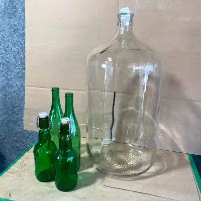 23 L (6 gal) Italy glass carboy; Plus: 23 wine bottles & 6 wire-cap bottles. $25, cash only please.