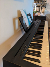 Yamaha P-45 digital piano with weighted keys.