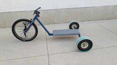 Home-built drift trike. Made from BMX front end. Pedals are modified to be free-wheeling. Back wheel...