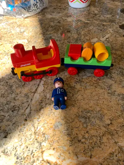 All sets are in excellent condition and priced separate. 1) Merry Train $8 2) road works constructio...