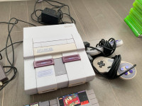 Super Nintendo with 20 Games + 2 Controllers
