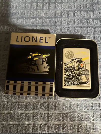 Hudson Lionel 773 train zippo $200 / Petty girl collection $60 , Two new Newcastle United football c...