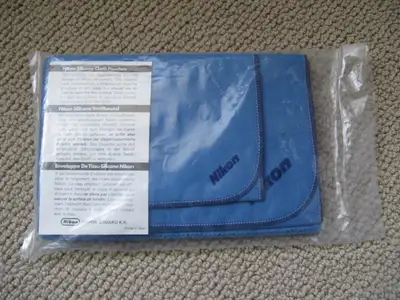 Sealed set of silicone cloth pouches manufactured by Nikon, View more