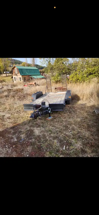 Car trailer for sale asking $6000 obo Lights and winch works Brakes 80 percent