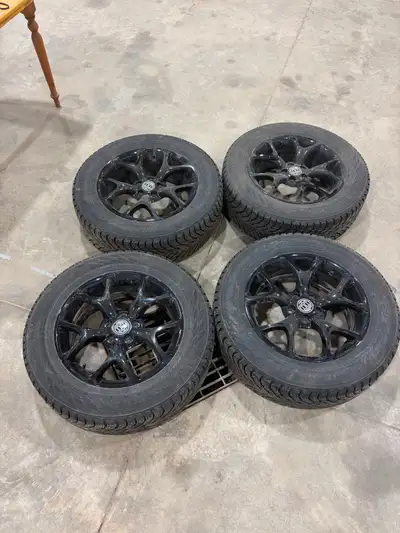 Selling a complete set of 4 Nokian Hakkapeliitta R3 SUV winter tires mounted on black alloy rims wit...