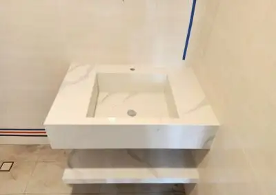 Upgrade your bathroom with this modern integrated sink and vanity combo, designed for a sleek, seaml...