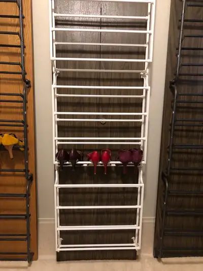 Ladies shoe rack mounted on my bifold doors belong to my bar. Bifold door and shoes not included.