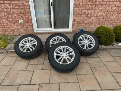 245/65R17 Winter tires on alloy rims, With Honda TPMS. Came off 2015 MDX Good condition, tires have...