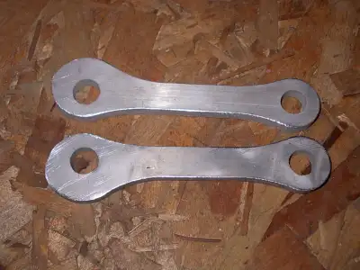 Water jet cut from 3/8 aircraft grade aluminum. Same shape as OEM (beefed up ends) to protect swing...