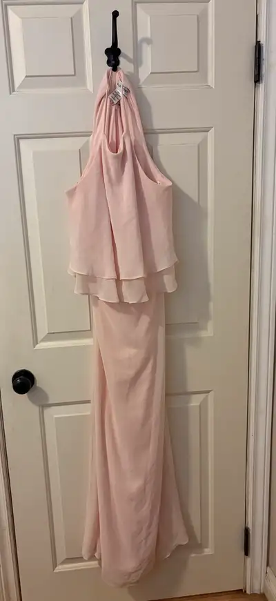 Light pink size 12 dress. Excellent condition only wore once to a wedding.