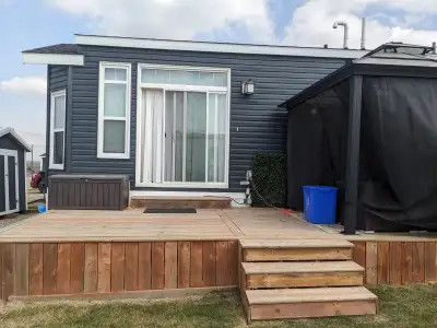 Welcome to Whispering Pines Phase 6 – Your Perfect Pine Lake Escape! This 2016 Triple M Housing Park...