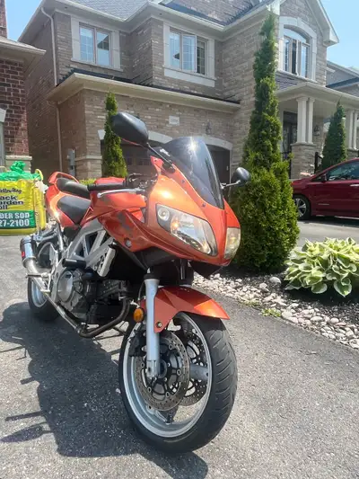 Selling my 2003 Suzuki SV650S 40400 kms Will safety for asking price Have ownership and clean title...