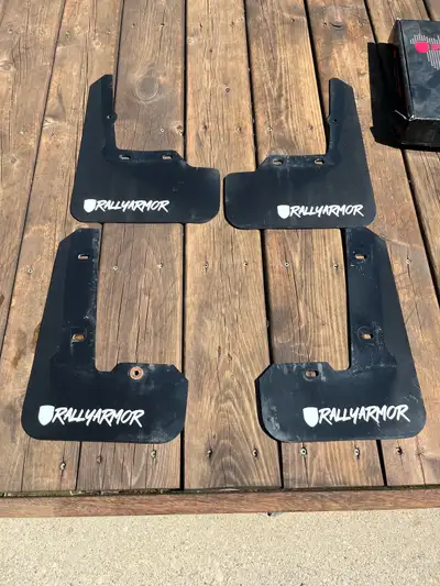 Rally Armor mudflaps. Came off a 2022 WRX will fit all VB’s. Pretty good condition, all hardware and...