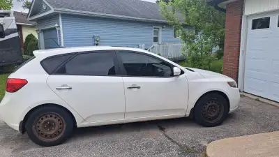 2011 Kia Forte 5 SX. 6 speed. All leather interior, heated seats, power windows, sunroof. Has winter...