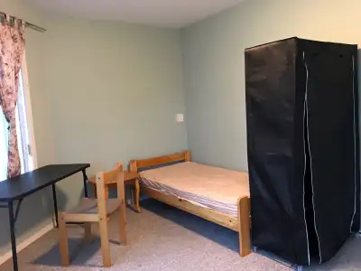 Furnished small Private room located on the ground floor. - Bus stop: ~12 min walk; ~10 to 11 min bu...