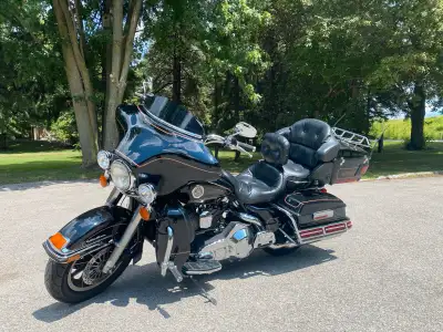 -Stock bike other than a taller set of bars and hog tunes Bluetooth adapter for stereo. -Clean bike...