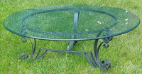 GORGEOUS CENTER TABLE - GLASS TOP + DECORATIVE WROUGHT IRON BASE