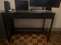 Two drawer desk with cable management compartment.