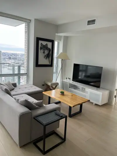 Furnished 2-bedroom sub-penthouse at the Tate in Downtown Vancouver. This high-floor corner unit off...