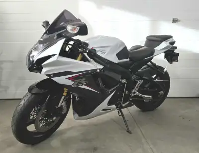 For tentative sale: 2014 Suzuki GSXR750. Arctic white. Only 8,813 kms. One owner, mature lady owned....