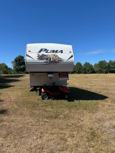 2010,25’ long puma fifth wheel camper trailer Sleeps 6, new tires and awning, only pulled short dist...