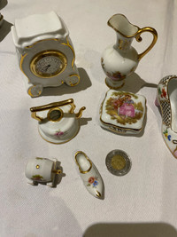 Set of 7 miniature Limoges porcelain figures.