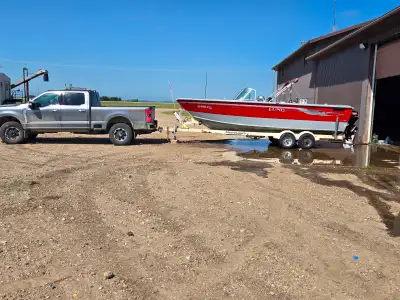 2005 lund baron 21.5 fuel injectec 5.7 inboard with a 15 hp kicker Has 2 livewells rod storage. Also...