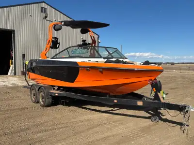 Beautiful surf/wake boat with very few hours. We love our boat but we never use it! We bought it new...