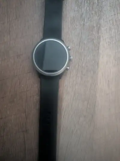 fossil smart watch . Connect with phone for message, water proof, has wellness setting to follow ste...