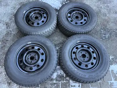 Bridgestone winter tires are like new with lots of tread left (11/32nds) No leaks, no plugs no uneve...